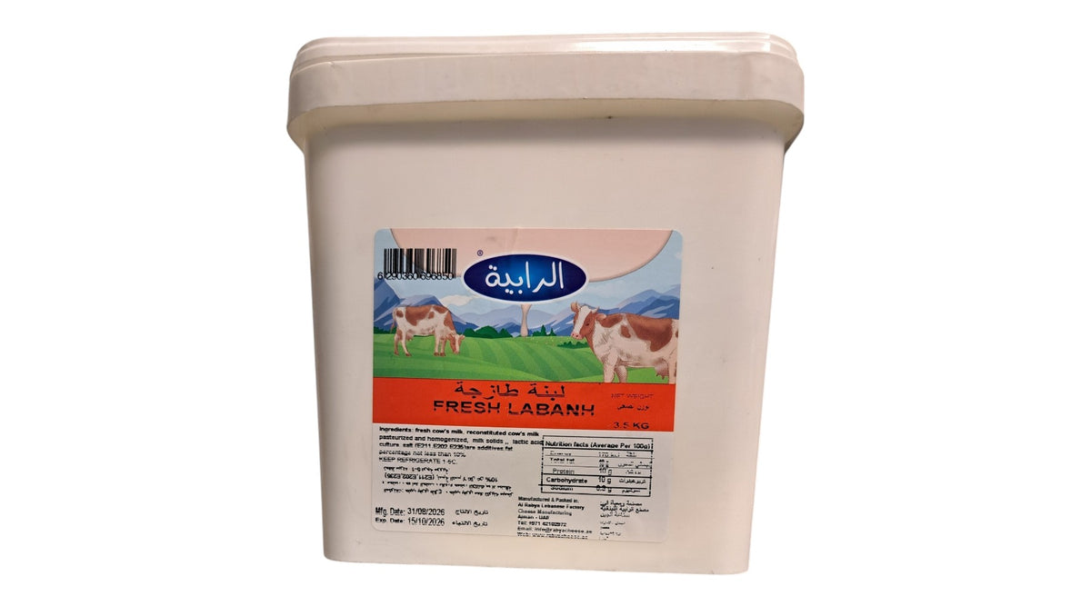A white plastic tub of Iraqi Fresh Labanh cheese, featuring a colorful label with cows and the brand name 'Al-Rabiya'.