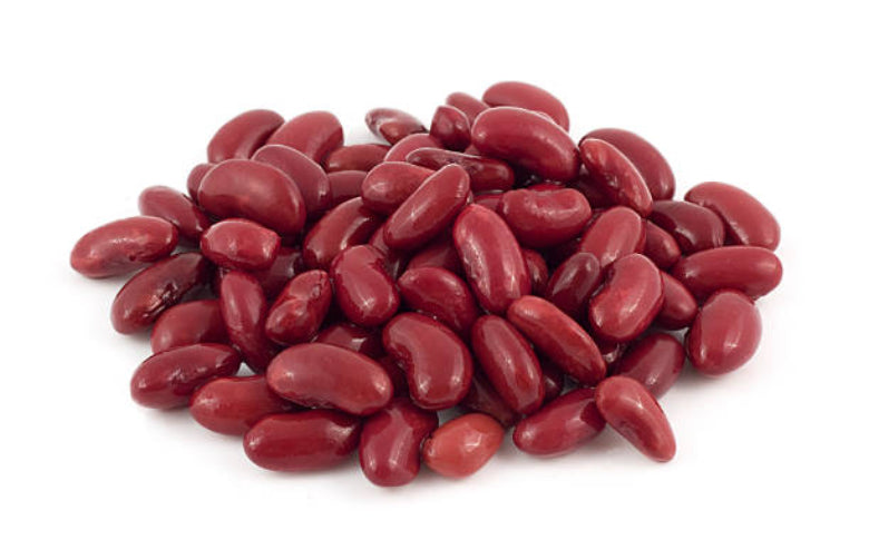 A pile of dry red kidney beans on a white background.