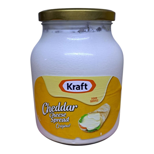 Jar of Kraft Cheddar Cheese Spread on a white background