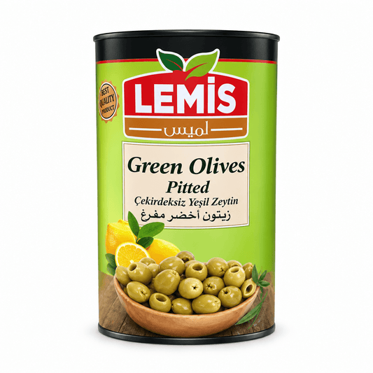 A can of LEMiS Green Olives Pitted on a clean white background. The cylindrical can features a bright green label with the red and white LEMiS logo, an illustration of green olives in a wooden bowl with lemon slices, and text in both English and Turkish.