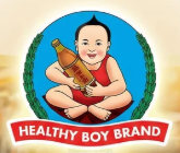 A circular logo featuring a cartoon baby sitting cross-legged and holding a bottle, with green laurel branches behind him and a red banner reading 'HEALTHY BOY BRAND' at the bottom.