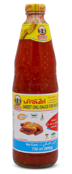 Bottle of sweet chili sauce with a yellow label on a white background