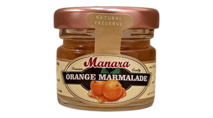 A glass jar of Manara Orange Marmalade with a copper-colored lid and a beige label featuring orange illustrations, set against a plain white background.